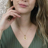 Model Wearing Beautiful Zodiac Aquarius Solid Gold Pendant By Jewelry Lane