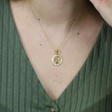 Model Wearing Beautiful Zodiac Aquarius Solid Gold Pendant By Jewelry Lane