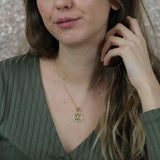 Model Wearing Beautiful Zodiac Aries Solid Gold Pendant By Jewelry Lane