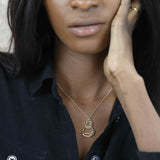 Model Wearing Unique Modern Science Beaker Style Solid Gold Pendant By Jewelry Lane