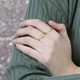Model Wearing Simple Elegant Square Stacker Solid Gold Ring By Jewelry Lane