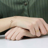 Model Wearing Simple Elegant Square Stacker Solid Gold Ring By Jewelry Lane