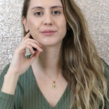 Model Wearing Beautiful Zodiac Taurus Solid Gold Pendant By Jewelry Lane