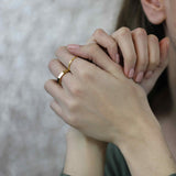 Model Wearing Beautiful Unique Modern Bolt Design Solid Gold Ring By Jewelry Lane