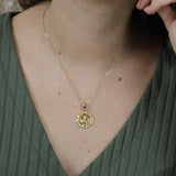 Model Wearing Beautiful Zodiac Aries Solid Gold Pendant By Jewelry Lane