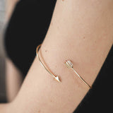 Model Wearing Beautiful Adjustable Arrow Style Solid Gold Armband Bangle By Jewelry Lane
