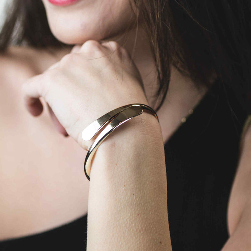 Model Wearing Solid Gold Open Cuff Bangle by Jewelry Lane