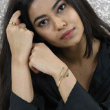 Model Wearing Solid Gold Open Cuff Bangle by Jewelry Lane