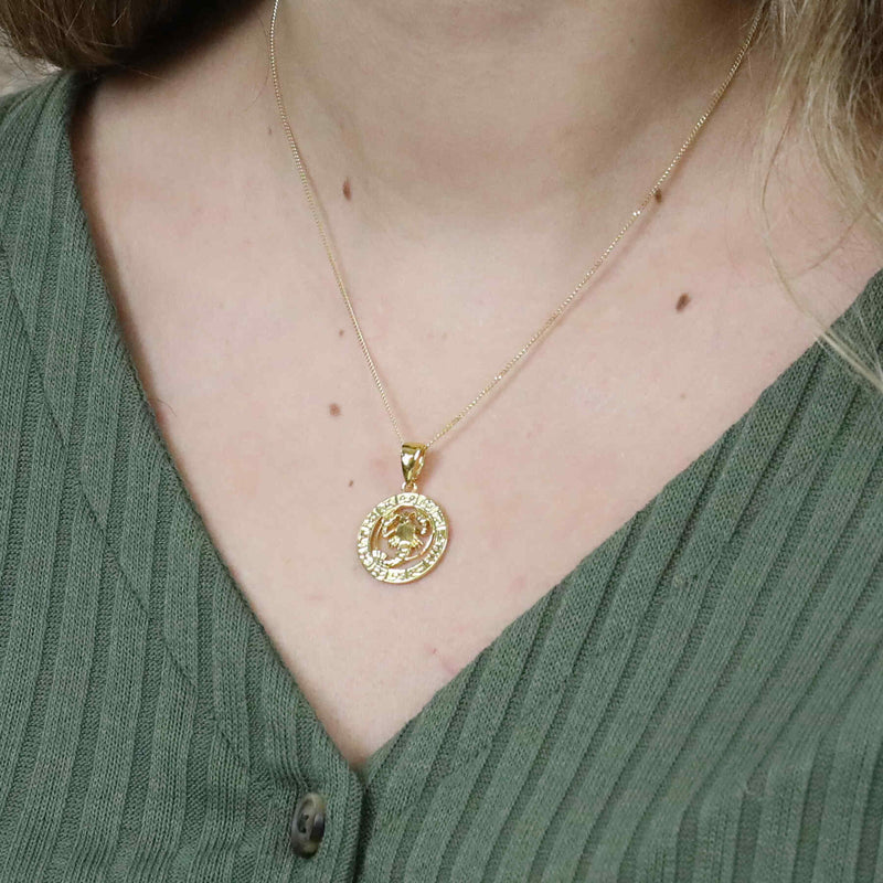 Model Wearing Beautiful Zodiac Cancer Solid Gold Pendant By Jewelry Lane