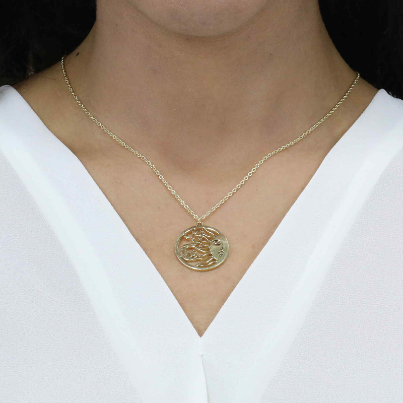 Model Wearing Beautiful Celestial Sun Moon Star Solid Gold Pendant By Jewelry Lane