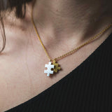 Model Wearing Beautiful Modern Two Tone Puzzle Design Solid Gold Necklace By Jewelry Lane