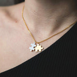 Model Wearing Beautiful Modern Two Tone Puzzle Design Solid Gold Necklace By Jewelry Lane