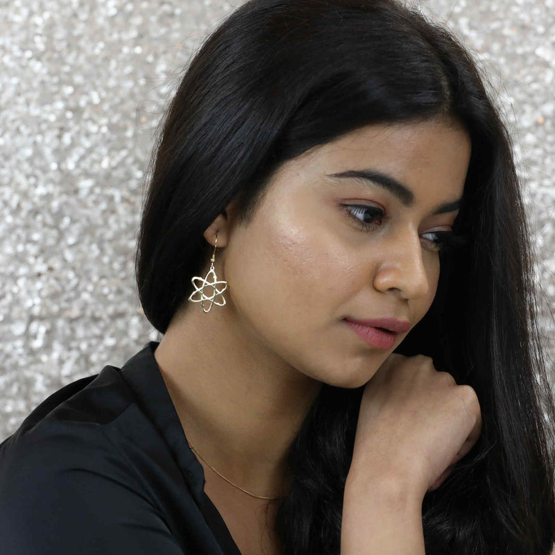 Beautiful Indian model wearing Beautiful Solid Gold Atomic Earrings by Jewelry Lane