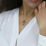 Model wearing Beautiful Egyptian Solid Gold Pendant by Jewelry Lane