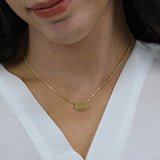 Model Wearing Beautiful Unique Football Solid Gold Pendant By Jewelry Lane