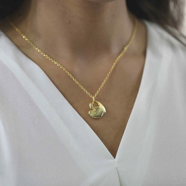 Model Wearing Beautiful Charming Heart Shaped Solid Gold Pendant By Jewelry Lane