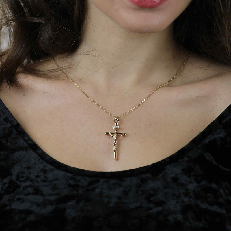 Model Wearing Beautiful Religious Jesus Cross Solid Gold Pendant By Jewelry Lane