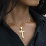 Model Wearing Elegant Religious Jesus Cross Solid Gold Pendant By Jewelry Lane