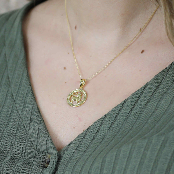 Model Wearing Beautiful Zodiac Leo Solid Gold Pendant By Jewelry Lane