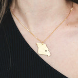 Model Wearing Elegant Unique Missouri State Design Solid Gold Pendant By Jewelry Lane