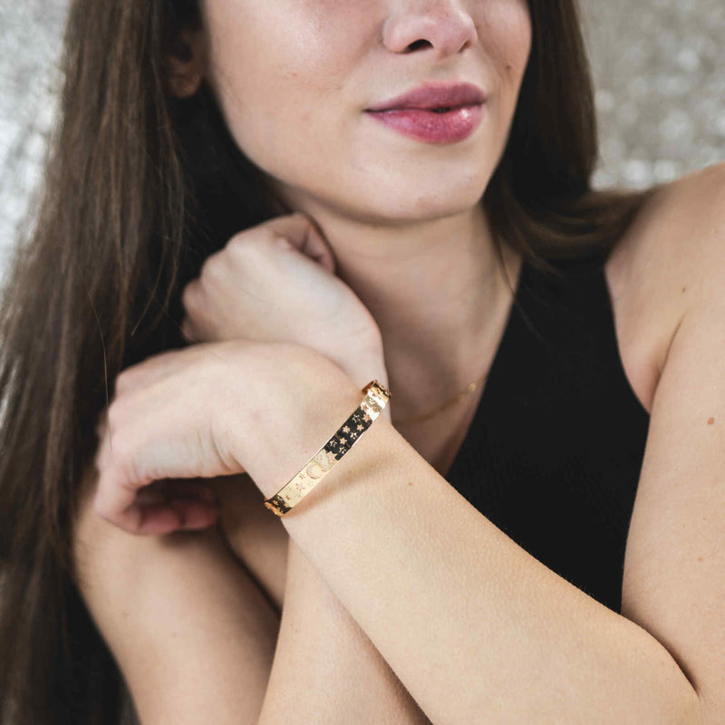 Model Wearing Beautiful Gorgeous Intricately Cut Moon Star Solid Gold Bangle By Jewelry Lane