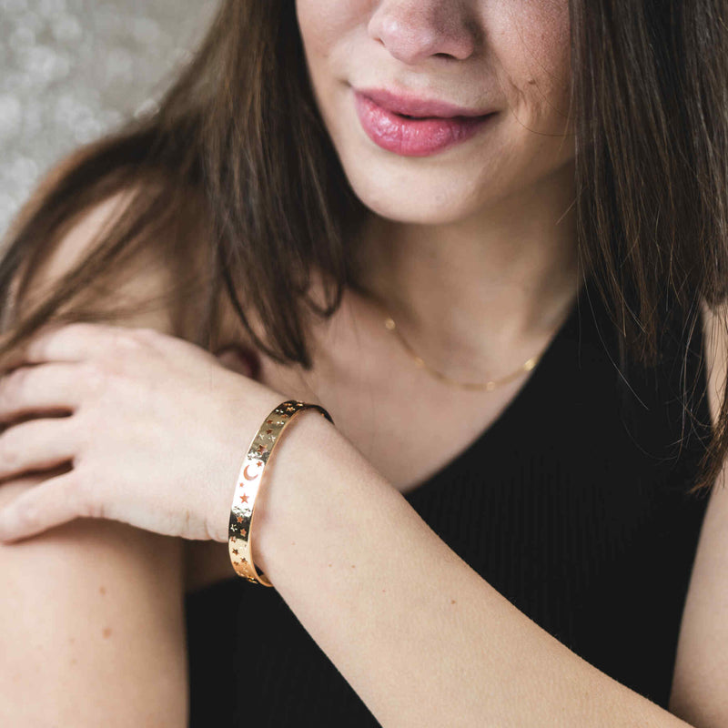 Model Wearing Beautiful Gorgeous Intricately Cut Moon Star Solid Gold Bangle By Jewelry Lane