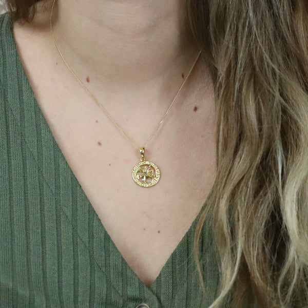 Model Wearing Beautiful Zodiac Sagittarius Solid Gold Pendant By Jewelry Lane