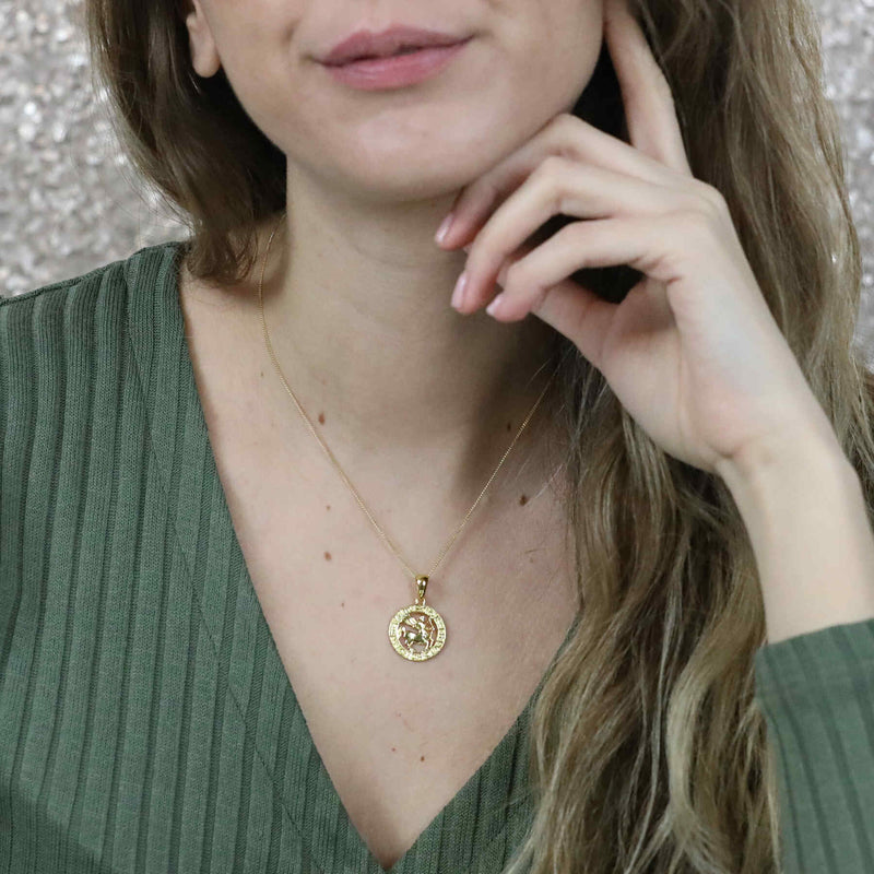 Model Wearing Beautiful Zodiac Sagittarius Solid Gold Pendant By Jewelry Lane