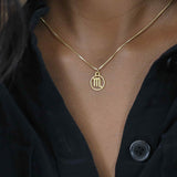 Model Wearing Charming Zodiac Scorpio Minimalist Solid Gold Pendant By Jewelry Lane