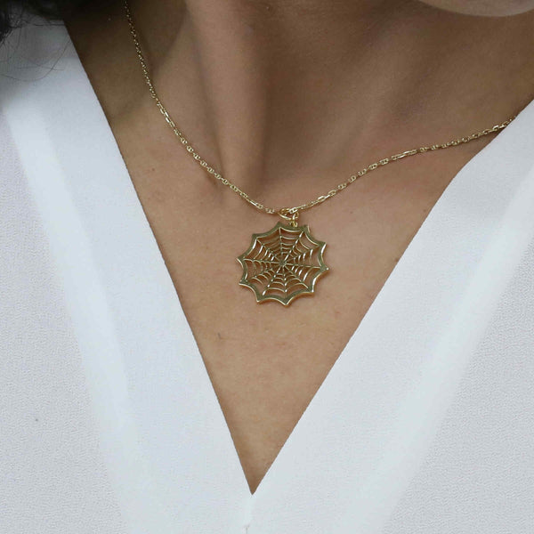Model Wearing Beautiful Modern Spider Web Solid Gold Pendant By Jewelry Lane