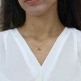 Model Wearing Beautiful Charm Star Design Solid Gold Pendant By Jewelry Lane