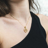 Model Wearing Beautiful Simple Expressive Te Amo Mama Solid Gold Pendant By Jewelry Lane