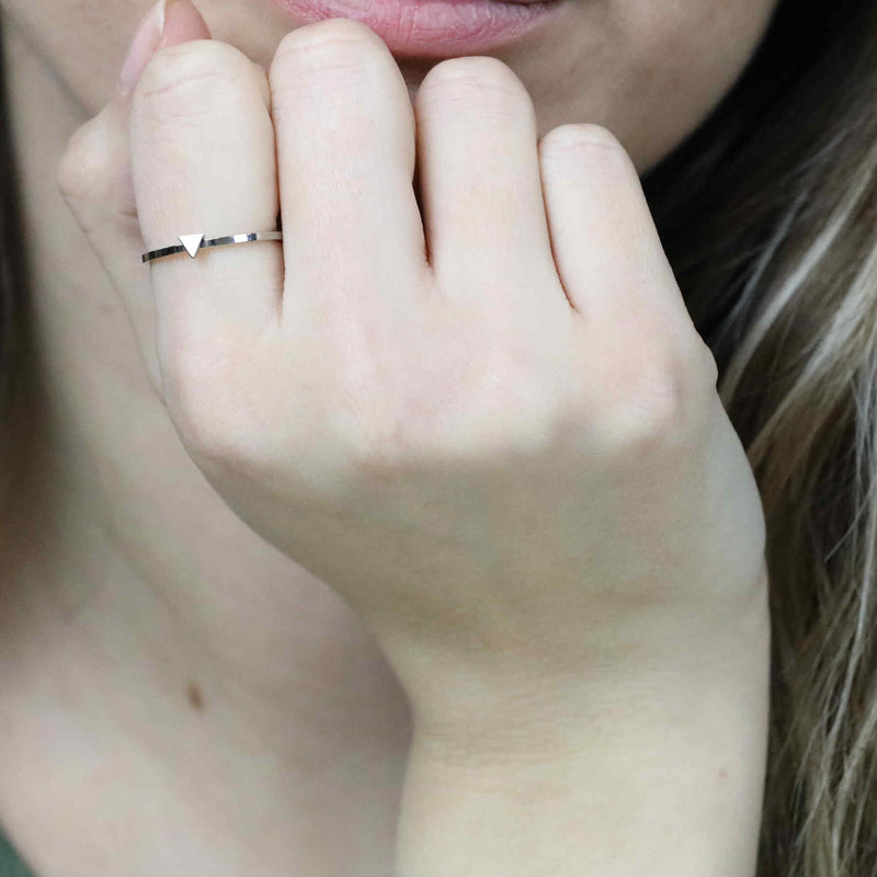 Model Wearing Simple Elegant Triangle Stacker Solid Gold Ring By Jewelry Lane