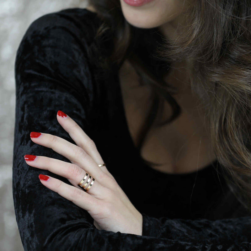Model Wearing Elegant Unique Triple Line Flat Cuff Solid Gold Ring By Jewelry Lane