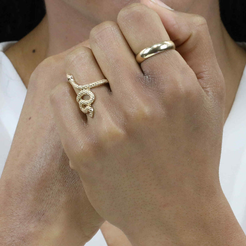 Model Wearing Charming Unique Snake Design Solid Gold Ring By Jewelry Lane