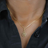 Model Wearing Charming Zodiac Virgo Minimalist Solid Gold Pendant By Jewelry Lane